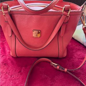 MCM 2 way bag! Some wear on corners. Clean inside and out 10 by 8 orange color